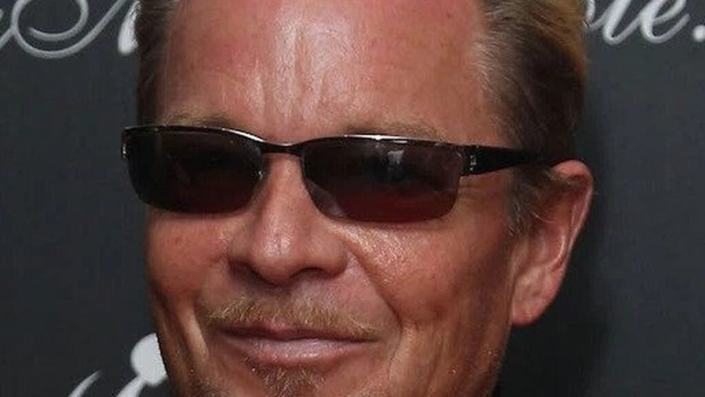 Anthony Hickox, director of Waxwork and Hellraiser III: Hell on Earth, wearing sunglasses in a publicity portrait