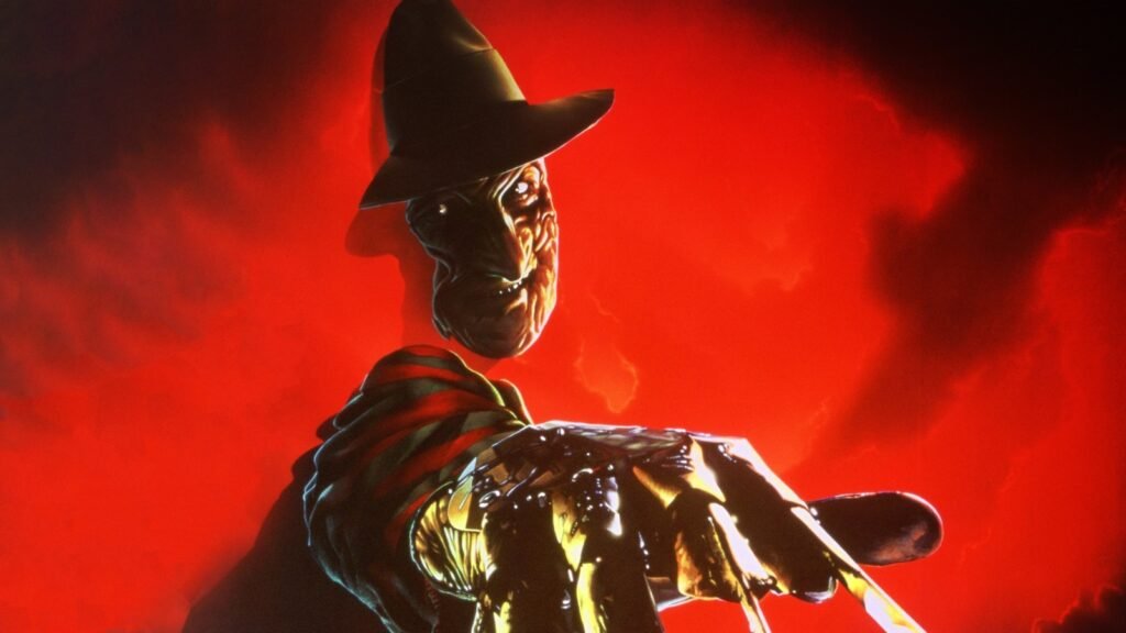 Freddy Krueger (Robert Englund) against a red sky in the key art for Freddy's Dead: The Final Nightmare (1991)