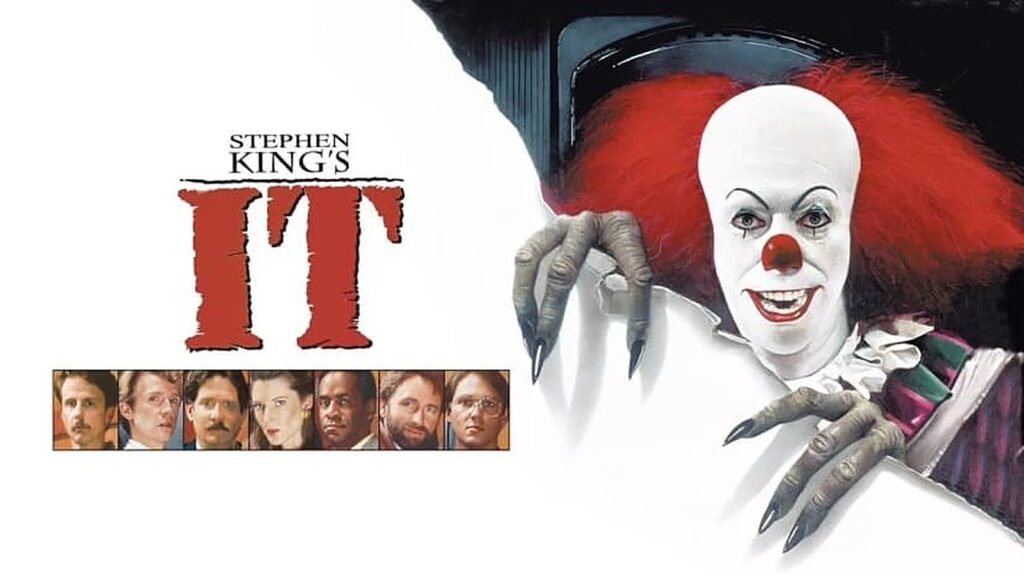 Stephen King's It (1990) official key art — Tim Curry as Pennywise looming over the adult Losers' Club