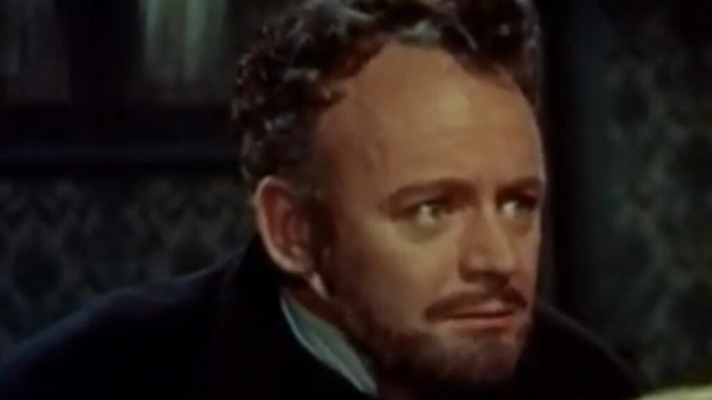 Robert Urquhart as Paul Krempe in The Curse of Frankenstein (1957), in a close view from the film's trailer